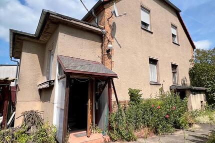 Doppelhaushälfte mit Sanierungsbedarf zu verkaufen