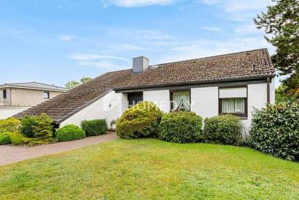 Exklusives Wohnen in Hanglage - Familienhaus mit Einliegerwohnung 5 zimmer