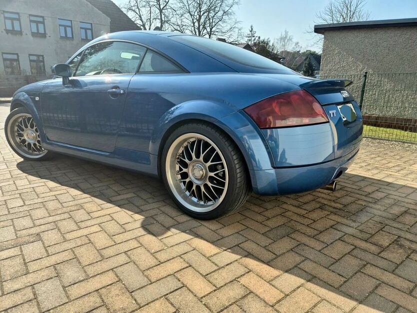 TT