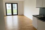 Helle 2-Zimmer-Wohnung mit Terrasse, moderne Neubau-Ausstattung mit Echtholzparkett + Einbauküche