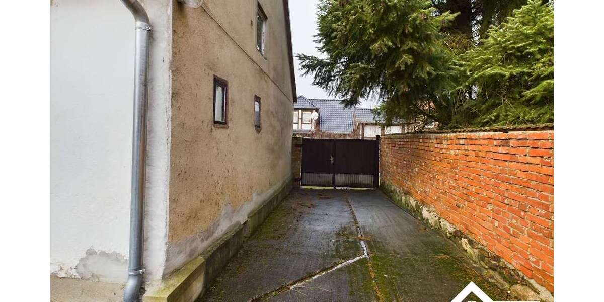 Einfamilienhaus mit viel Potenzial, großem Grundstück und vielseitig nutzbarem Nebengebäude - Einfamilienhaus Grimme Grimme | Angebot:25717453