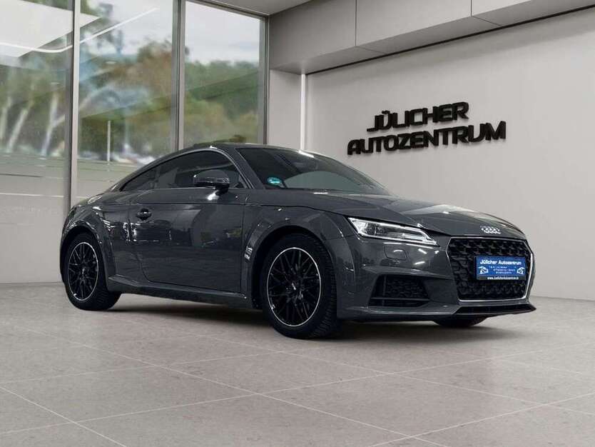 TT