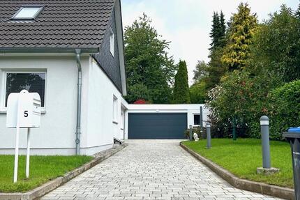 Exklusiv kernsanierte Doppelhaushälfte mit großzügigem Garten 3.5 zimmer