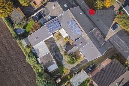 Mehrfamilienhaus-Duo mit insg. 5 Wohneinheiten, großem Innenhof und Potenzialflächen in ruhiger Lage zimmer