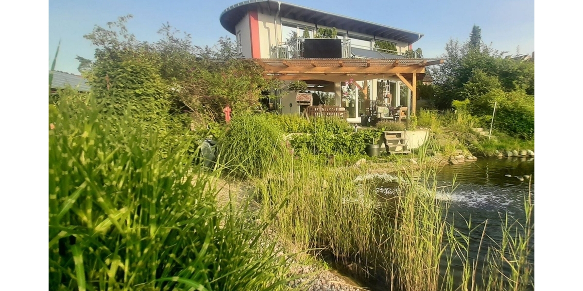 Ein Juwel der Nachhaltigkeit: Sonnenhaus bei Coburg - Zweifamilienhaus Rödental | Angebot:23787139