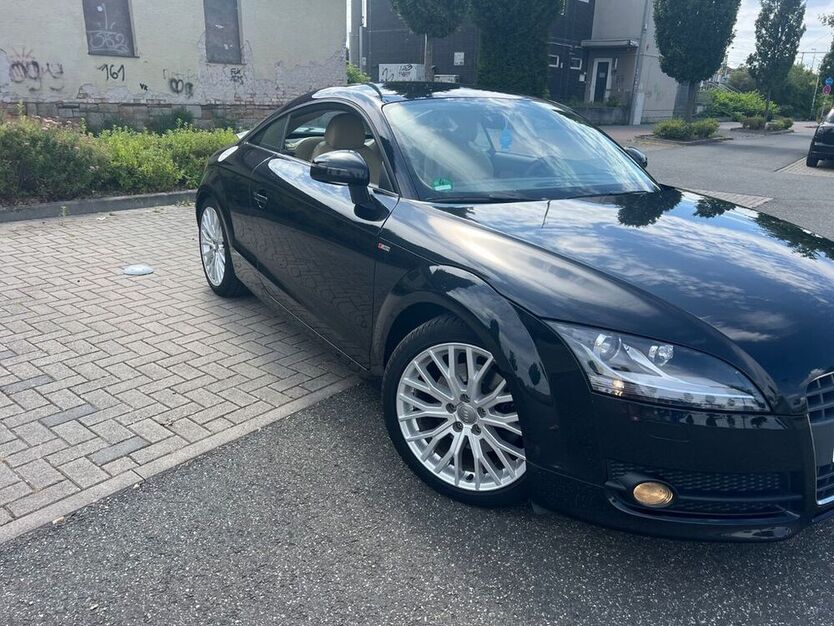 TT