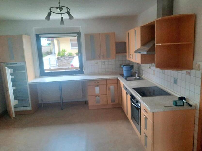 Charmante 2 Zimmer Eigentumswohnung mit Balkon und Gartenzugang