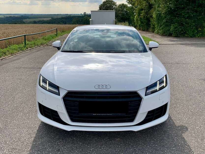 TT
