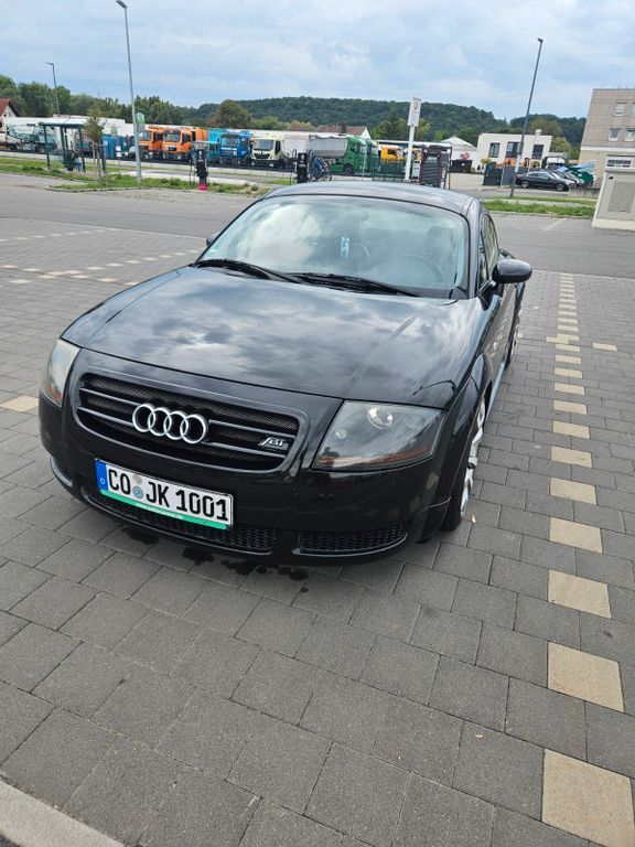 TT