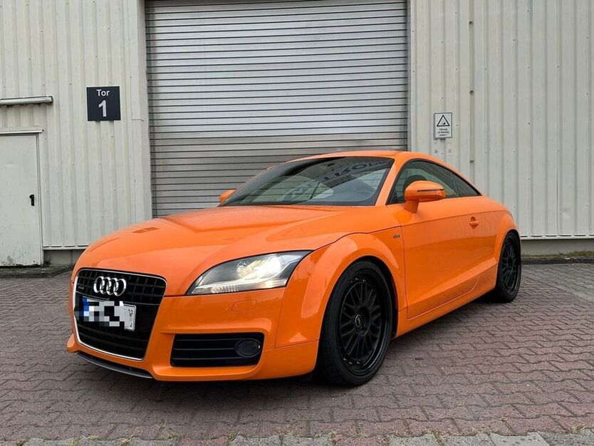 TT