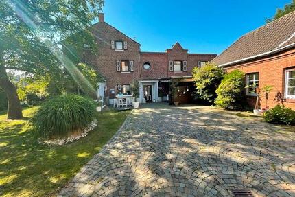 Wohnen und Arbeiten unter einem Dach Charmantes Haus mit Gewerbefläche in MG-Windberg
