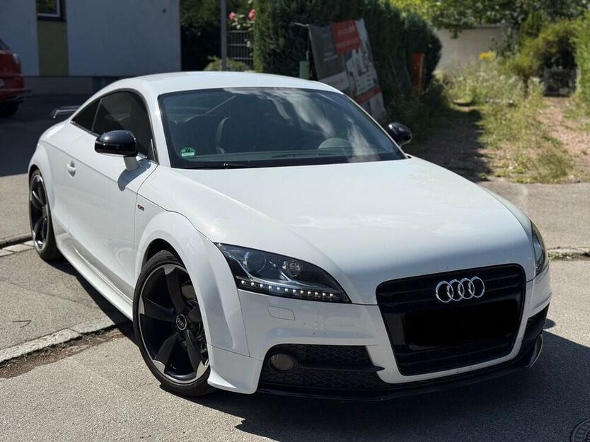 TT