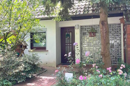 PURNHAGEN-ImmobilieN - Reihenmittelhaus mit Garage in gesuchter Wohnlage von Bremen-Burgdamm!