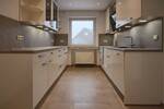 2-Zimmer-Wohnung mit Dachterrasse und Kfz-Stellplatz