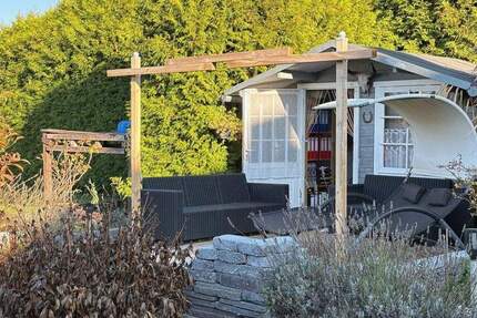 Ranch-Ambiente & moderne Ausstattung: Einfamilienhaus mit großem Grundstück 5 zimmer