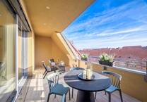 Grundsaniertes Denkmalobjekt: Dachneubau mit Sonnenlounge
