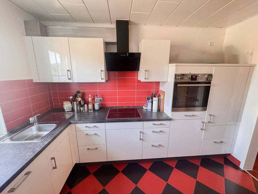 Familienfreundliches Reihenmittelhaus mit Tiefgarage und Garten in ruhiger Lage von Scherpenseel