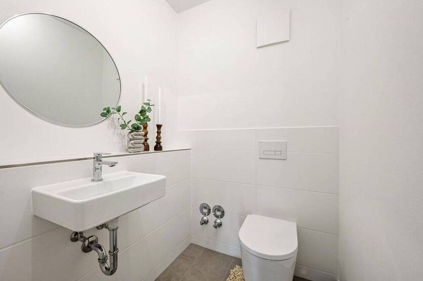 3 Zimmer-Wohnung mit Garten, Einbauküche und Tiefgaragenstellplatz in beliebter Lage