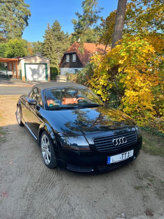 TT