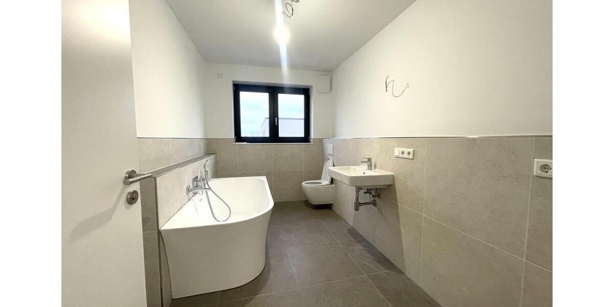 Zwischen Reben und Rhein - ERSTBEZUG! Exklusive 3-Zimmer-Neubauwohnung mit Balkon & TG-Stellplatz 3 zimmer