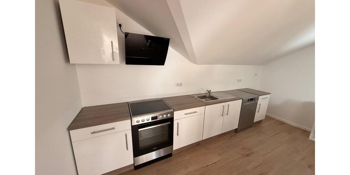 2,5-Zimmer Dachgeschosswohnung mit Gartenanteil in gehobenem Stil 2.5 zimmer