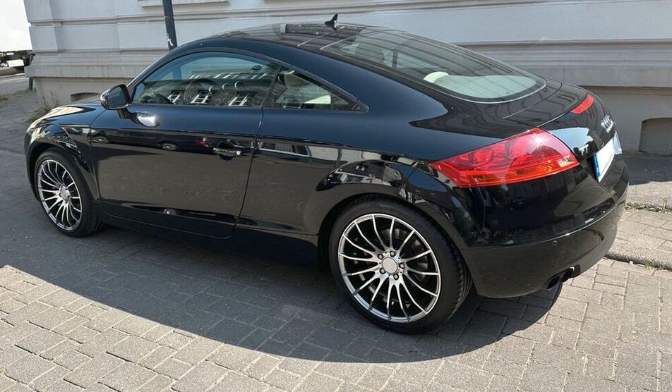 TT