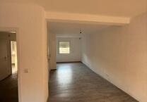 Erstbezug nach Kernsanierung: Moderne EG-Wohnung mit Garten