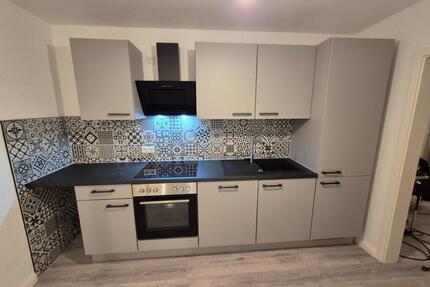 modernisierte Erdgeschoßwohnung mit Terrasse und Kamin