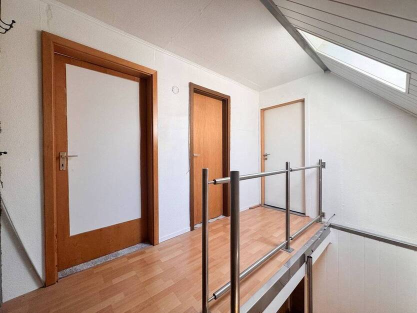 Familienfreundliches Reihenmittelhaus mit Tiefgarage und Garten in ruhiger Lage von Scherpenseel
