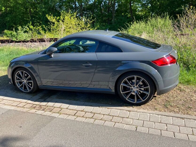 TT