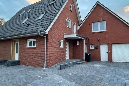 Modernes Wohnen mit Komfort und Stil – sanierte Wohnung mit großem Grundstück 4 zimmer