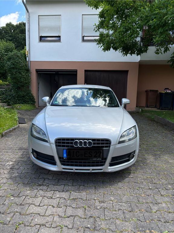 TT