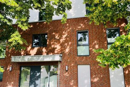 Moderne Erdgeschosswohung mit Garage und Garten 3 zimmer