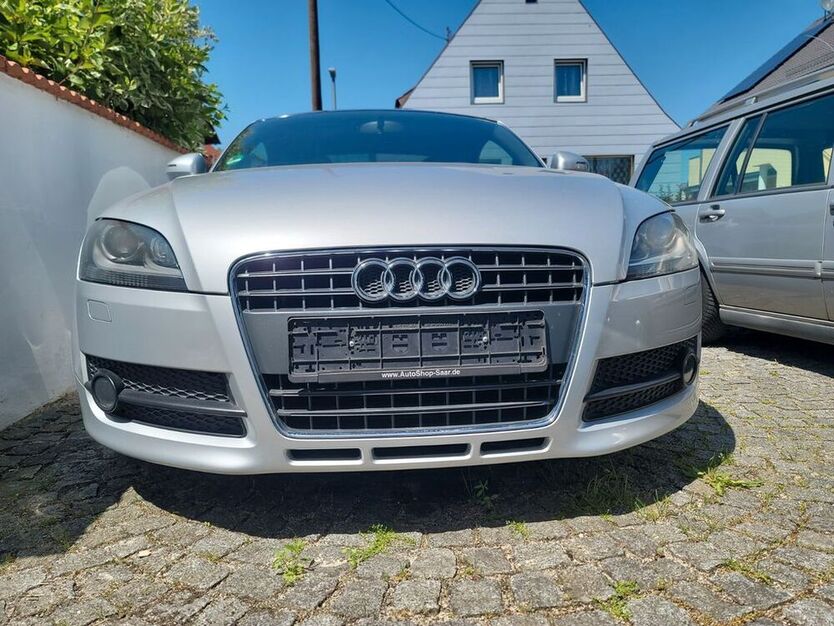 TT