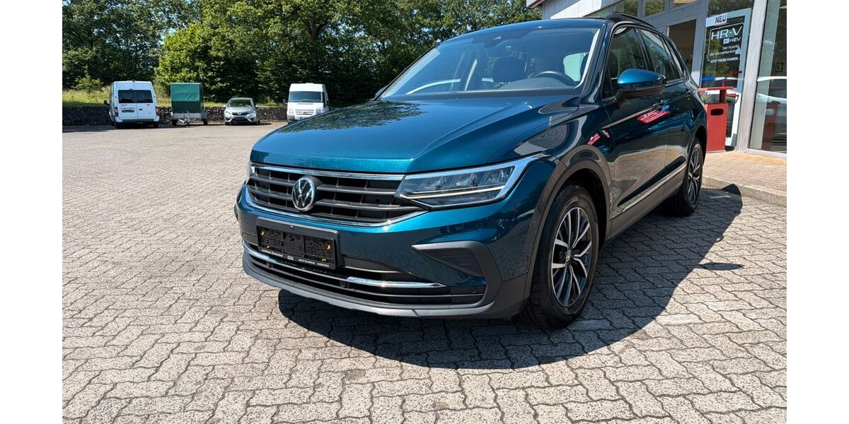 VW Tiguan 90.500 km 23.990 &euro; Bornhoeved 24619
