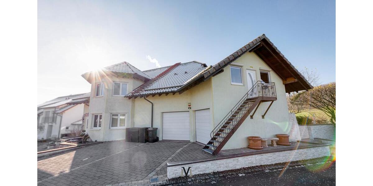 Großes Familienhaus mit Premium-Ausstattung und Vermietungsoption 8.5 zimmer