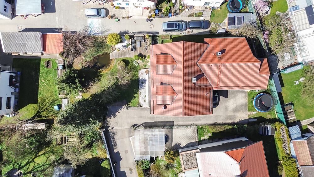 WINDISCH IMMOBILIEN - Für Kapitalanleger - gepflegtes Zweifamilienhaus auf großem Grundstück 8 zimmer