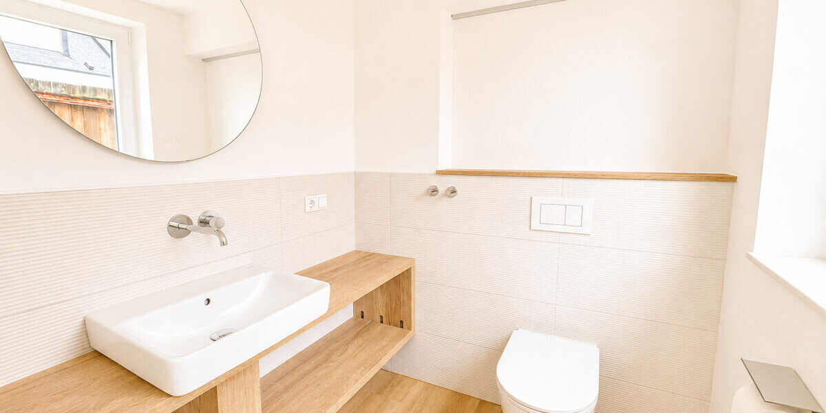 Exklusive kernsanierte Loftwohnung im Erstbezug mit Privatteich & Panorama-Glasfront - Erdgeschoßwohnung Münster / Albachten Albachten | Angebot:26621543