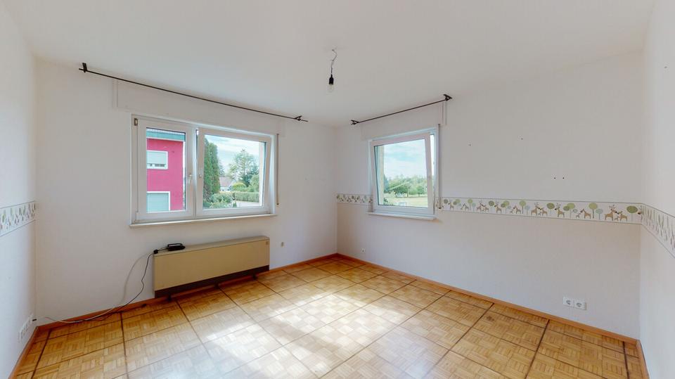 Charmante 3-Zimmer-Hochparterrewohnung mit Balkon, Garage und Gartennutzung in Au am Rhein 3 zimmer