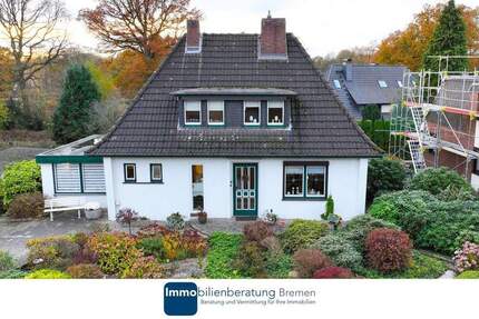 Charmantes Einfamilienhaus auf attraktiven Hanggrundstück mit Carport 7 zimmer