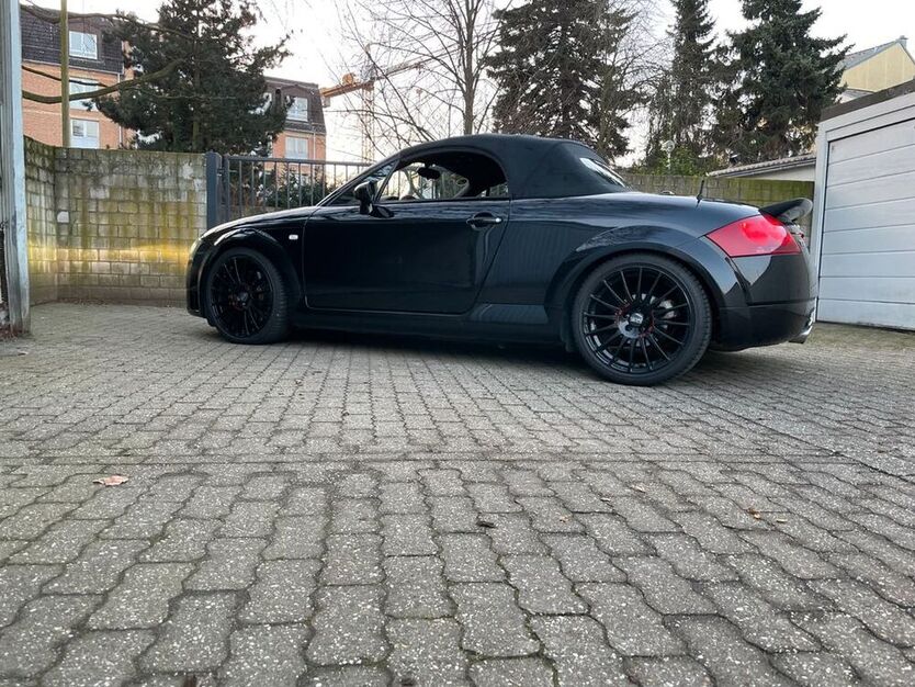 TT
