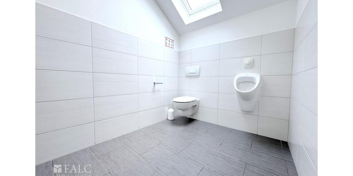 Moderne Büroeinheit in historischer Backsteinarchitektur zimmer