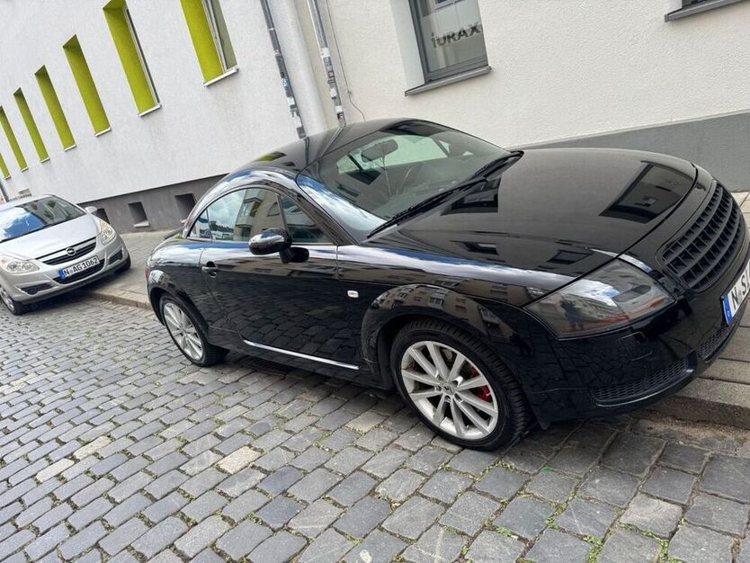 TT