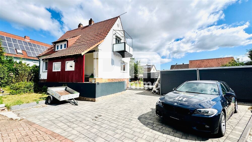 Kernsaniertes Einfamilienhaus mit Doppelgarage, großem Garten und Home-Office-Oase - Einfamilienhaus Schwalmstadt | Angebot:27053931
