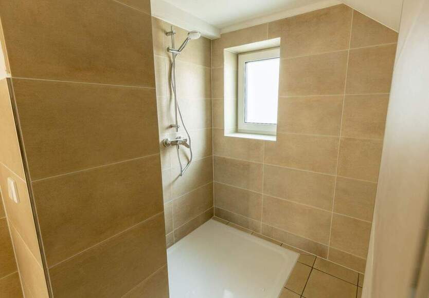 Helle 4-Zimmer-Wohnung mit kleinem Garten und Stellplatz – Erstbezug nach Sanierung