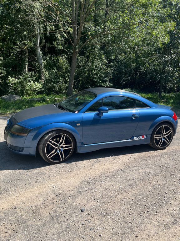 TT