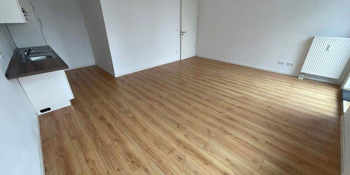 Moderner Grundriss mit geräumiger Wohnküche und Balkon 1 zimmer