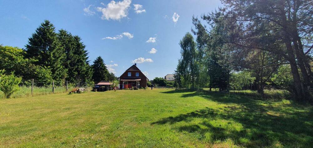 Neuwertiges EFH mit Wärmepumpe, Carport, 2 Bäder, EBK und eigenes Grünland - Einfamilienhaus Dömitz Heidhof | Angebot:26057443