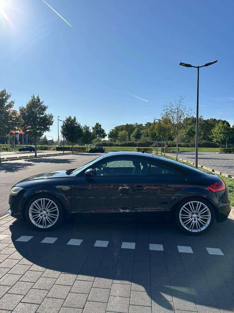 TT