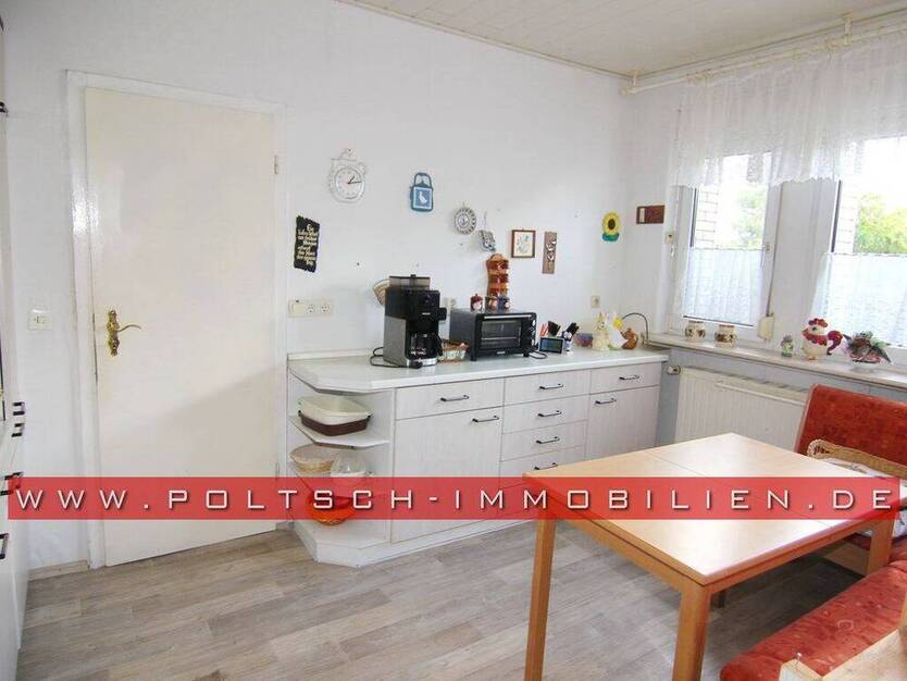 EFH im Bungalowstil mit Wintergarten, Keller und großem Grundstück in ruhiger Siedlungslage